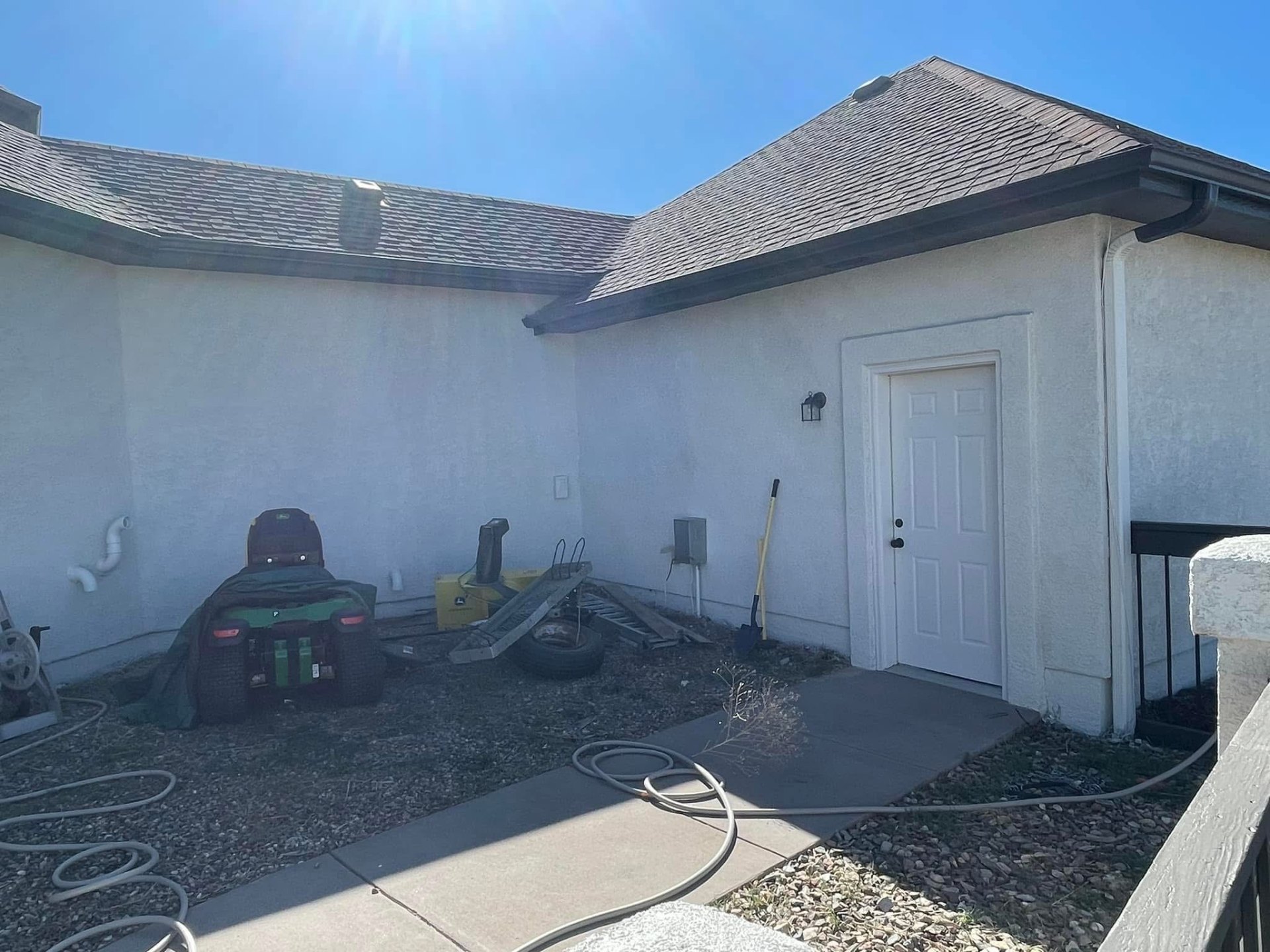 Side courtyard & utility area — after